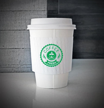 White printed coffee cup sleeves printed on front with one color is wrapped on a white paper cup sitting on a countertop